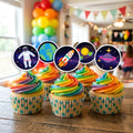 Space Galaxy cupcake toppers on decorated cupcakes