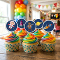 Space Astronaut cupcake toppers on decorated cupcakes